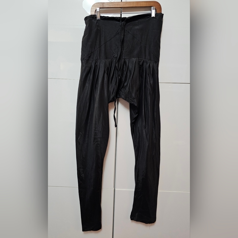 Black churidar-style pants and a dupatta